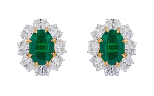 istock Pair of elegant emerald and diamond earrings with a white background. 2175975829
