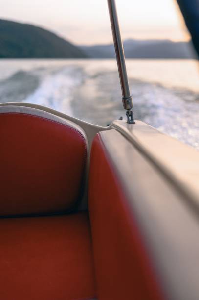 istock Red boat seat with lake and mountain view at sunset 2175977162
