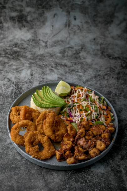 istock Breaded shrimp dish with dressing, salad 2175977442