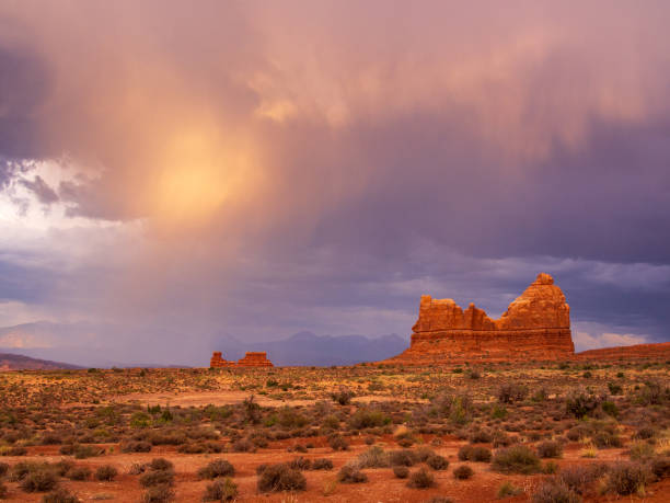 istock The desert like landscape in Arches National Park with dramatic clouds. 2175991660