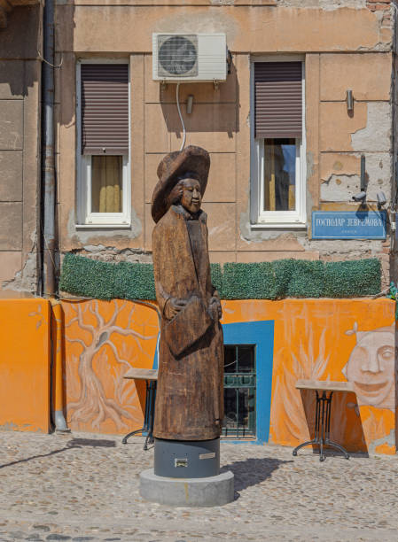 Belgrade, Serbia - May 15, 2024: Wooden Carving Sculpture Traveling Actor Monument by Author Petijevic Jovo at Gospodar Jovanova Street.