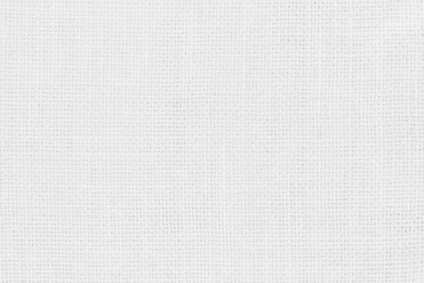istock Jute hessian sackcloth woven texture pattern background in light white color textile. White canvas fabric, linen cotton cloth rough texture background of watercolour paper craft blank cardboard empty. 2176001392