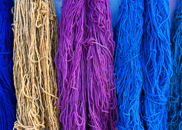 istock Colorful Wool Yarns Hanging: Purple, Blue, Beige 2176013842