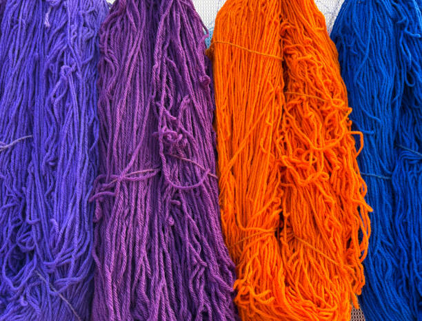 istock Colorful Wool Yarns Hanging: Purple, Blue, Orange 2176013940