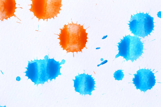 Various color paint drops on paper, causing dispersion of color, use it for design your work concept.