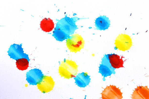 Various color paint drops on paper, causing dispersion of color, use it for design your work concept.