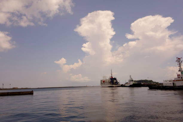 Cumulonimbus clouds, Yokosuka New Port in midsummer, a relaxing port scene around noon