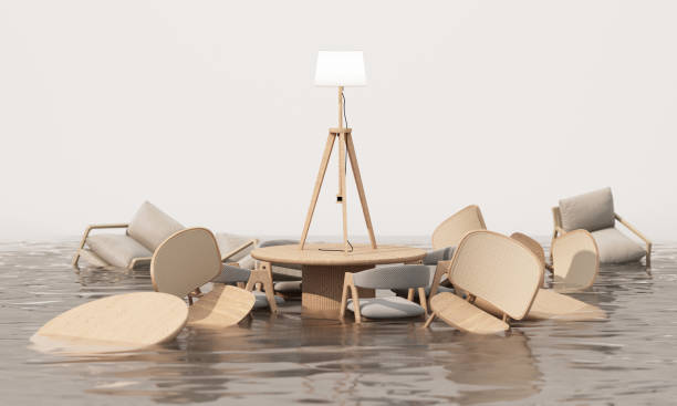 istock Wooden chairs, table, and lamp floating on water create a surreal, minimalist interior design scene, blending natural textures with a flooded environment for an abstract aesthetic 3d rendering 2176037960