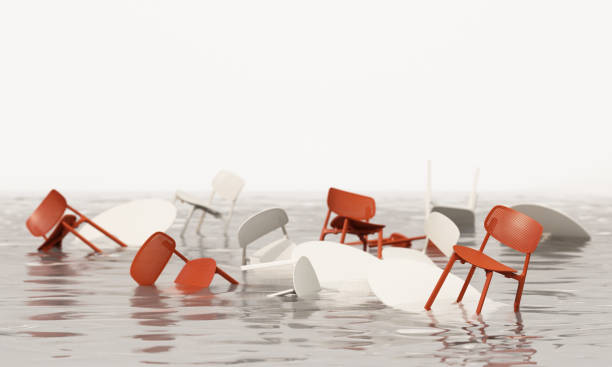 istock Floating red and white chairs and tables in water create a minimalist, surreal concept, depicting an abstract interior design scene in a flooded environment with modern aesthetics 3d rendering 2176037966