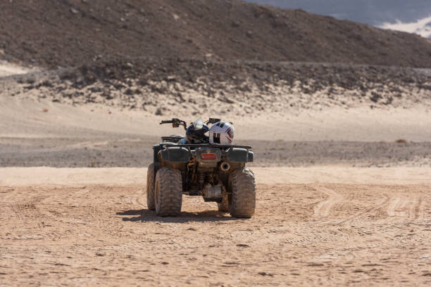 istock ATV stands in the desert on a hot day 2176042704