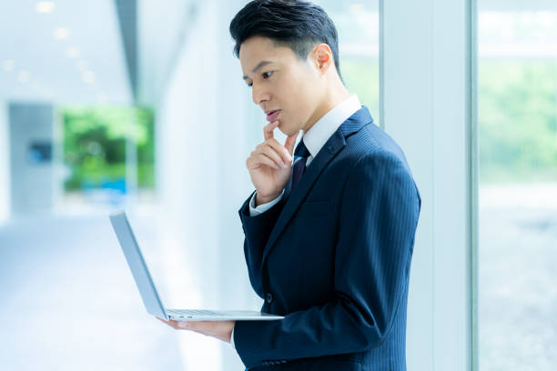 istock business person working in office 2176047218