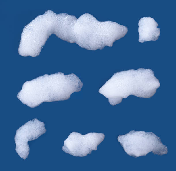 istock Set of white foam isolated on blue background. 2176049052
