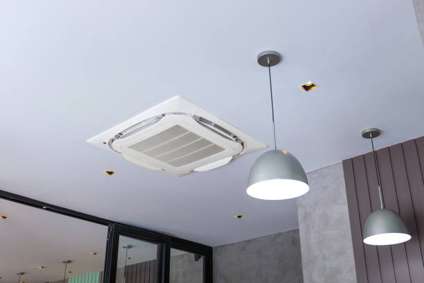 istock Modern ceiling mounted cassette type air conditioning system in coffee shop 2176050725