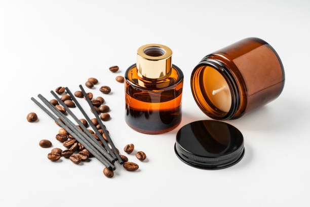 istock Aromatic coffee-scented candles and essential oils with coffee beans and incense sticks 2176061319