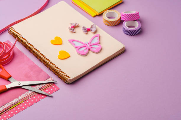 istock Crafting supplies on a purple background ready for creative projects 2176063533
