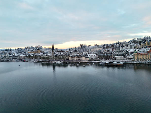 istock Tranquil Winter Lake with Snow-Capped Mountains 2176063901