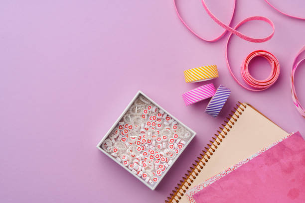 istock Crafting supplies on a purple background ready for creative projects 2176065142