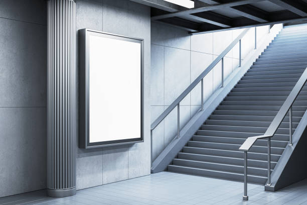 istock Empty billboard mockup near a staircase in a modern subway station. 3D Rendering 2176066330
