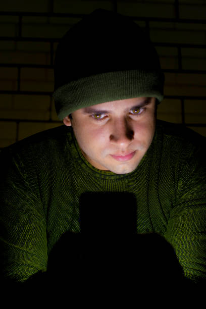 istock Scary man, green shirt, mysterious look 2176067143
