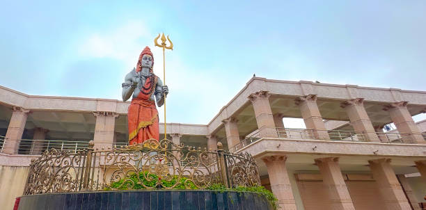 istock statue of indian god shiva holding trident 2176069764