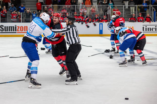istock Referee Attempts to Break Up Intense Hockey Fight 2176074477
