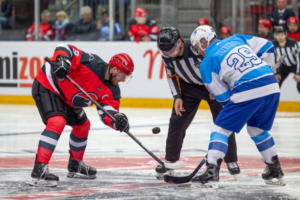 istock Ice Hockey Face-Off in Action 2176074562