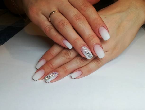 istock Woman's hands with French manicure 2176074602