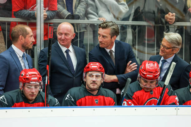 istock Coaches Strategizing During Ice Hockey Game 2176074640