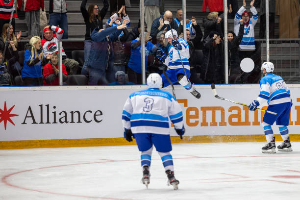 istock Hockey Player Celebrating Goal Mid-Air 2176074645
