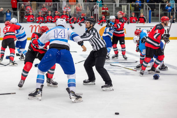 istock Intense Hockey Fight as Referees Step In 2176074733