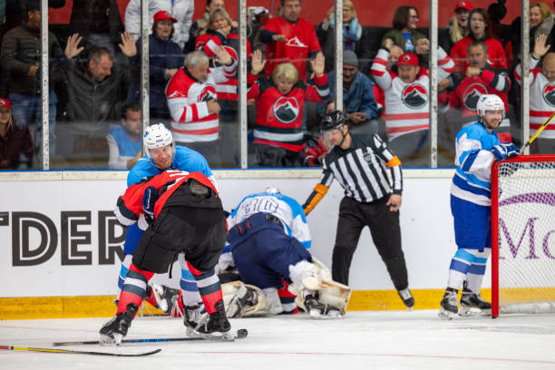 istock Players Engage in Physical Confrontation on the Ice 2176075252