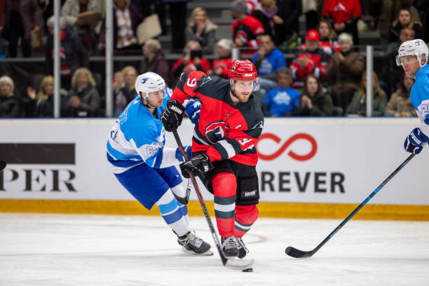 istock Ice Hockey Match in Action 2176075281