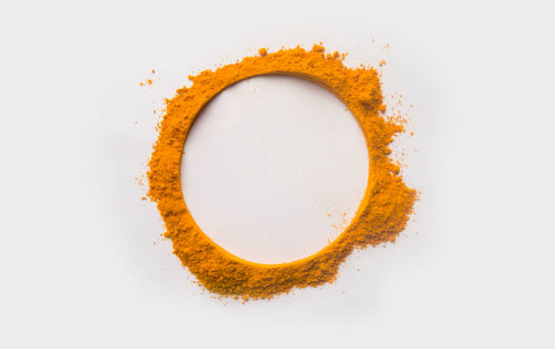 istock Circle Frame of turmeric powder on white background 2176075932