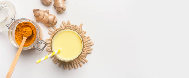 istock Healthy ingredients for making turmeric milk drink 2176076094