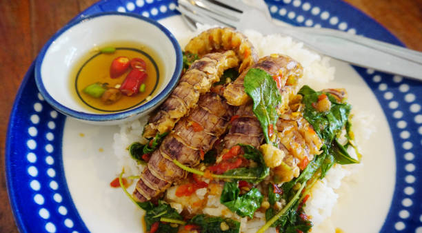 istock Stir-fried Mantis shrimp with basil top on rice, Seafood Thai style cuisine 2176077248