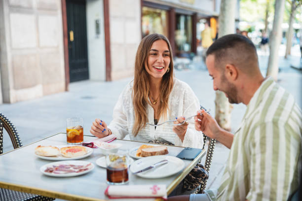 istock Hispanic Couple Dining Outdoors in Madrid 2176078983