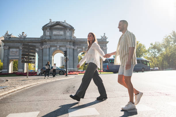 istock Hispanic Couple Visiting Puerta De Alcala in Madrid 2176078997