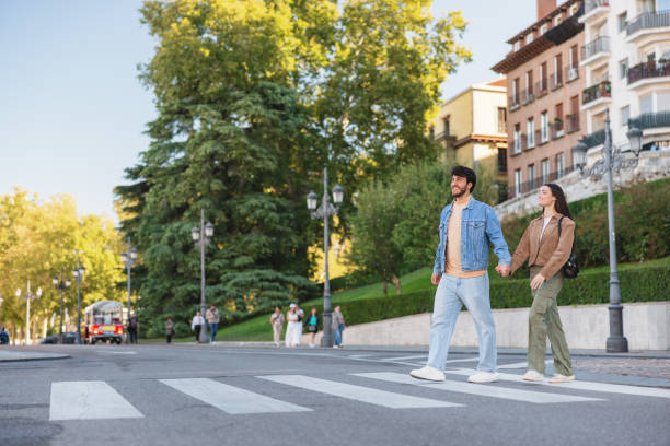 istock Hispanic Couple Enjoying a Walk in Madrid 2176079037