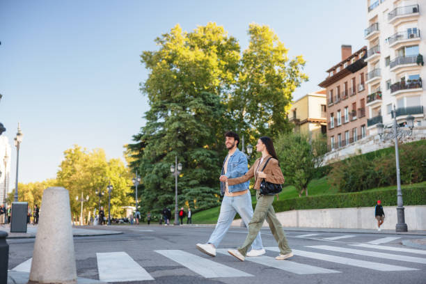 istock Hispanic Couple Crossing Street in Madrid 2176079042