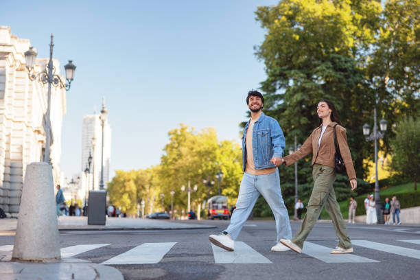 istock Hispanic Couple Enjoying a Walk in Madrid 2176079047