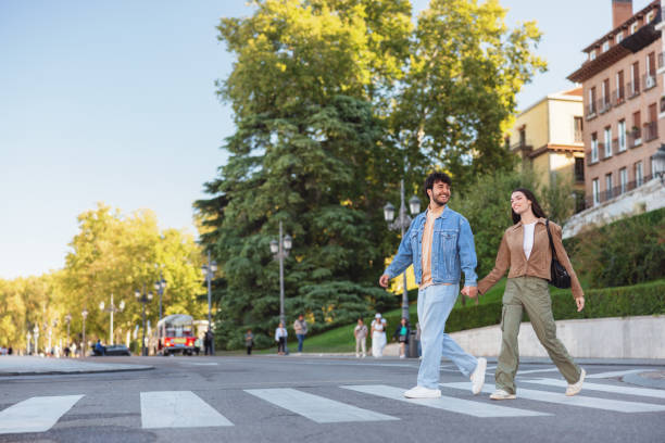 istock Hispanic Couple Enjoys Walk During Madrid Visit 2176079048