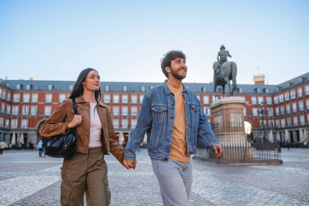 istock Hispanic Couple Enjoying Visit to Plaza Mayor Madrid 2176079057