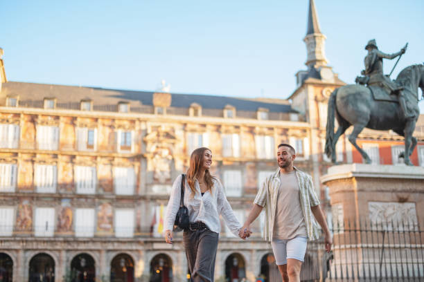 istock Hispanic Couple Having Fun Visiting Plaza Mayor Madrid 2176079062