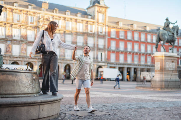 istock Hispanic Couple Exploring Plaza Mayor in Madrid 2176079072