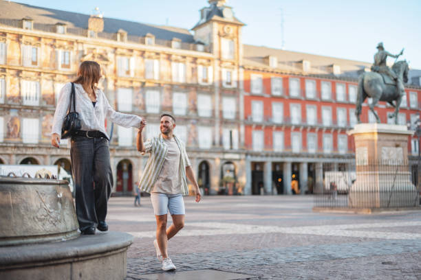 istock Hispanic Couple Enjoying Plaza Mayor in Madrid 2176079073