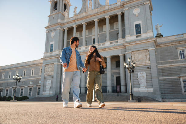 istock Hispanic Couple Enjoying Almudena Cathedral in Madrid 2176079106