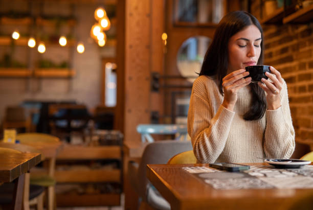 istock Woman enjoying coffee 2176094796