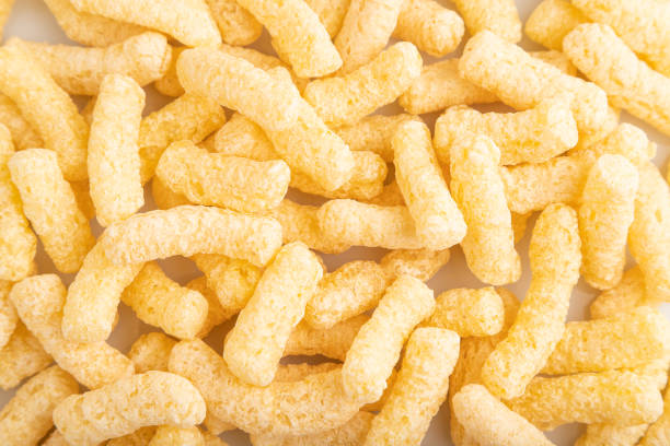 istock Corn flakes sticks with caramel isolated on white, top view, close up. 2176095597