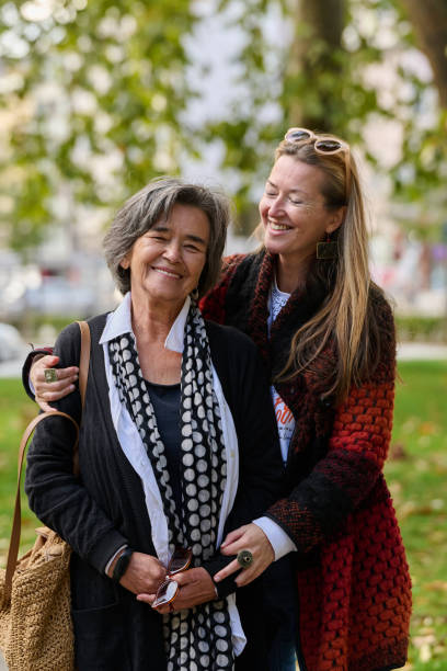 istock A Heartfelt Embrace: A Daughters Support for Her Mother on a Beautiful Autumn Day. 2176108631