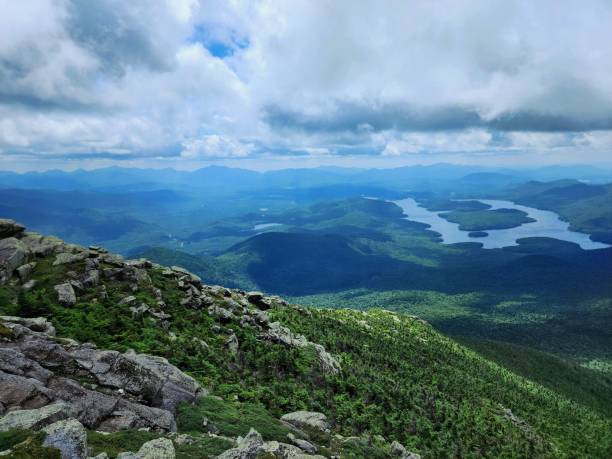 istock Scenic mountain summit view with river and cloudy sky 2176109483